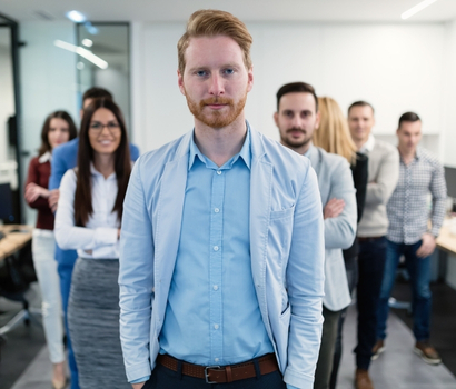 group-picture-of-business-team-posing-in-office-XBMVPWK.jpg